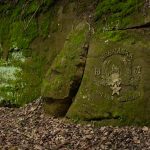 Plaque on the entrance to Roland Sherman memorial area.