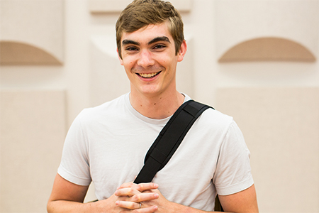 Male student with backpack