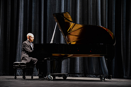 student playing the piano