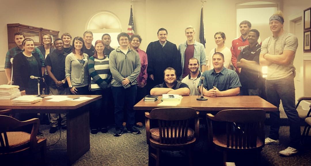 Dr. Mahan and criminal justice students in Judge's Office.