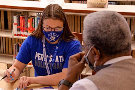 Student at advising in the library